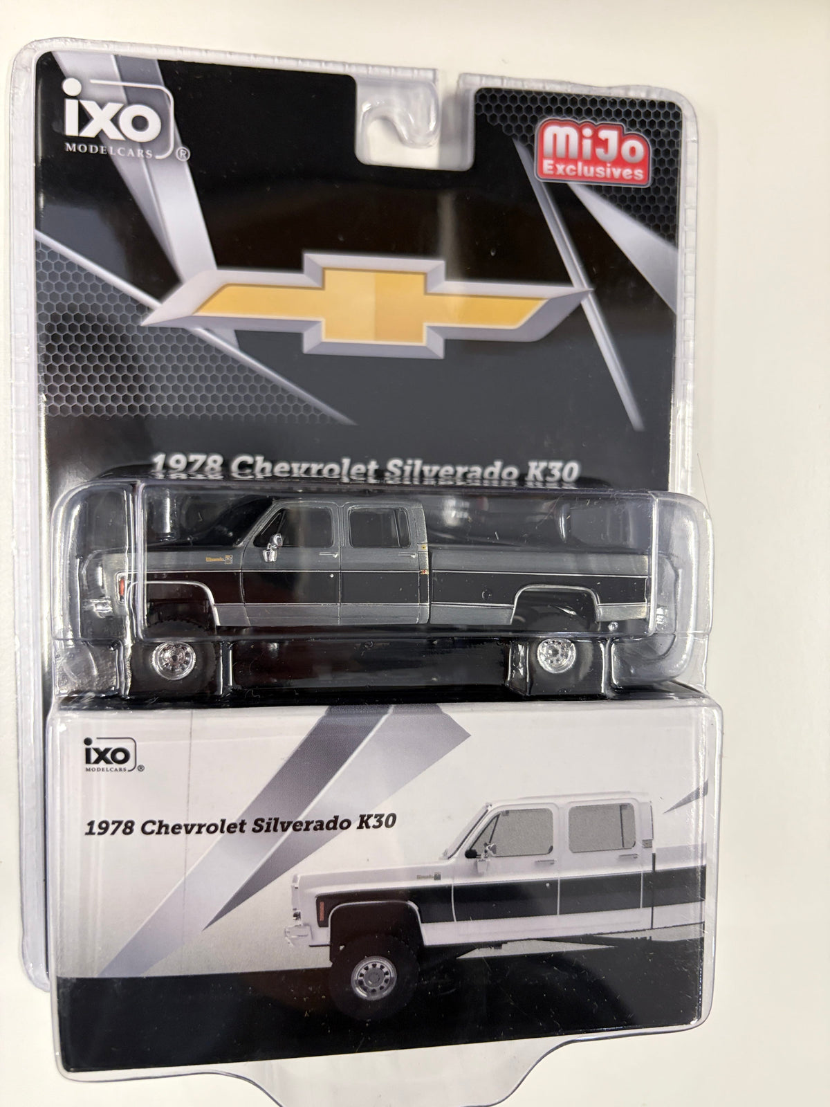 Chase Chevrolet Silverado K30 Crew Cab Fleetside Lifted White w/ Black Two Tone Limited Edition IXO Model 1:64 IAPR1012CHASE